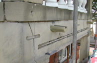 Sandstone lintel before repair, severely cracked Sandstone lintel before repair